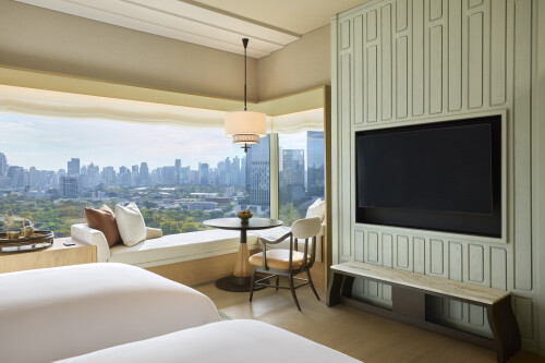 dusit-thani-bangkok-unterkunft-deluxe-eck-zweibettzimmer-lounge.jpg